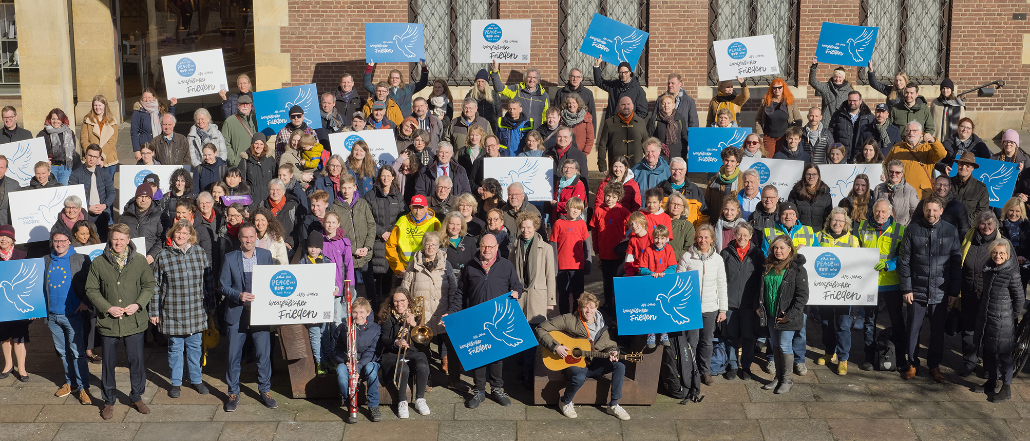 Gruppenfoto auf dem Platz des Westfälischen Friedens