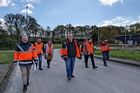 Fachdelegation aus Winnizja: Besuch bei den Stadtwerken, Menschen, draußen, Arbeitskleidung